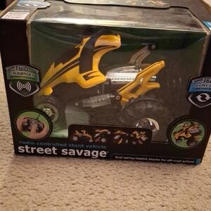 Sharper Image Yellow and Black Radio Controlled Stunt Vehicle - Street Savage